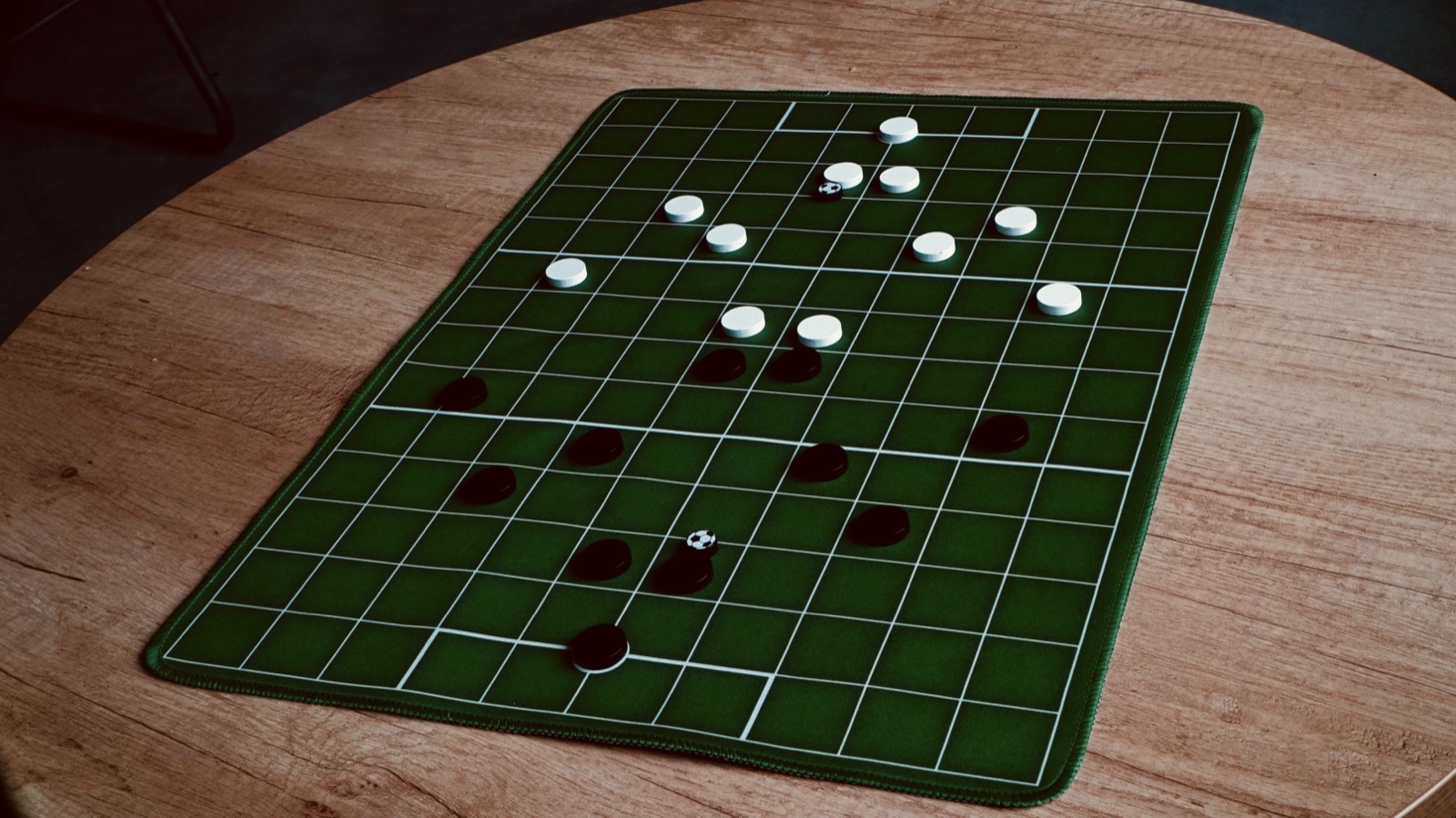 The Taka board on a wooden table